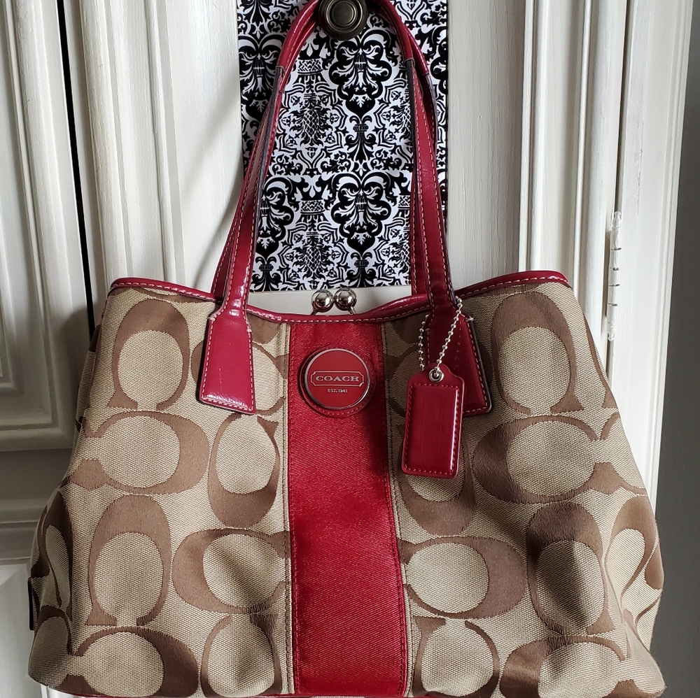 Coach brown and burgundy red kiss lock satchel